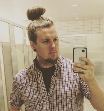 RIFLE, Colo. — While the city is known for its ranchers and cowboys, it is also showing its hip side as men throughout the city are now sporting the trendy “Man Bun” hairstyle, along with carrying the “Man Purse.”